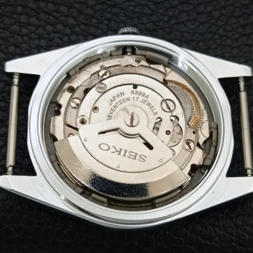 Vintage 1983 Seiko Automatic Mens Silver Watch W/daydate & Gold Accents